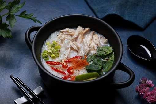 Rice Noodles and Chicken on blue background