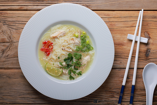 Rice Noodles and Chicken on wood table