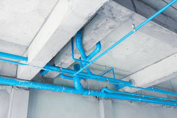 istock pvc water blue plastic pipe installing at ground floor roof in under construction building 2012849751