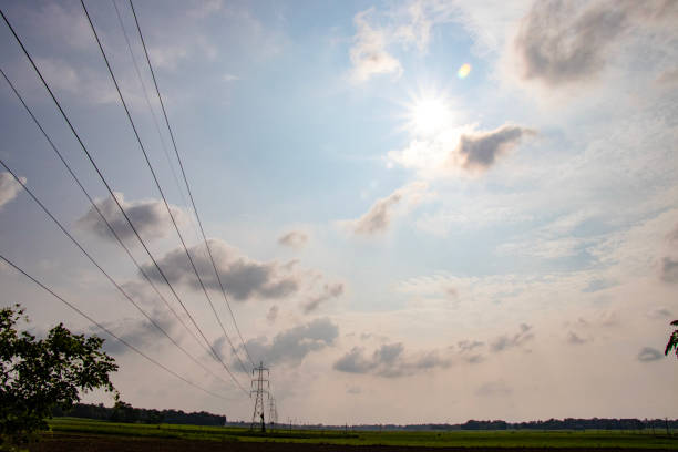 istock Pylons with electrical wire on the farm field 2012852524