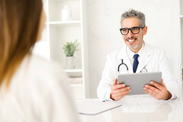 istock A conversation between a healthcare professional and a patient during appointment 2012888588