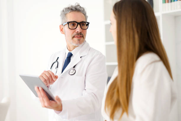 istock A conversation between a healthcare professional and a patient during appointment 2012888592