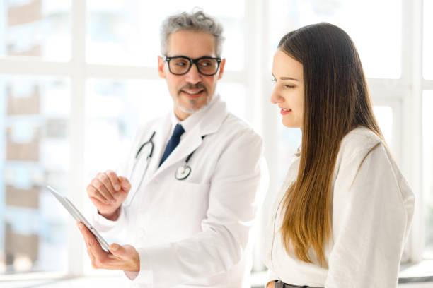 istock A conversation between a healthcare professional and a patient during appointment 2012888595