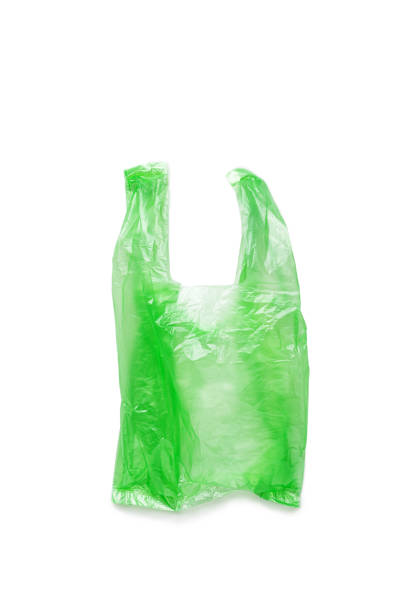 istock Close up Green plastic bag isolated on white background, cut out object, design element. Single-use polythene packet, Biodegradable packaging waste, Disposable bag for food, bag free day 2012889170