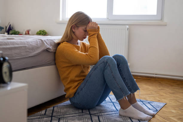 istock Bored young woman in bedroom 2012936183
