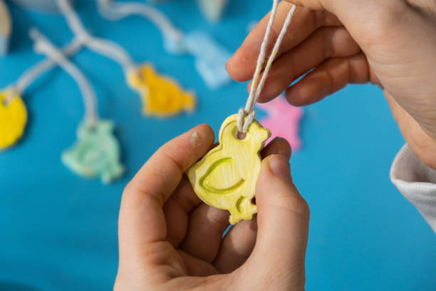 istock Children air dry clay activity handicraft idea. DIY process step by step instruction. Preparing for Easter holiday decorating. Modern organic design minimalistic plastic free sustainable 2012938408