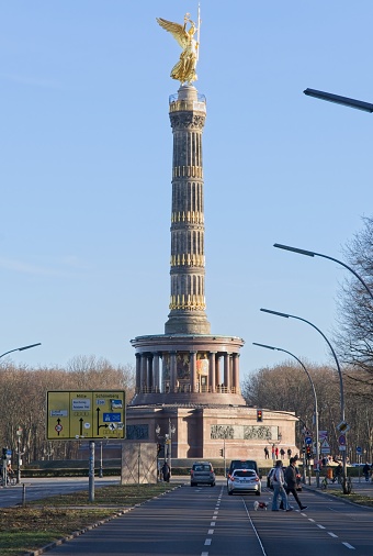 Berlin, Germany - Jan 28, 2024: Victory Column in Berlin. View from the middle of the street. Sunny winter day. Selective focus