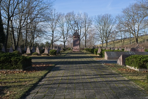 Elsterwerda, Germany - Jan 29, 2024: This Red Army war cemetery contains the graves of 456 Soviet soldiers who were killed in 1945 during Second World War. Sunny winter day. Selective focus