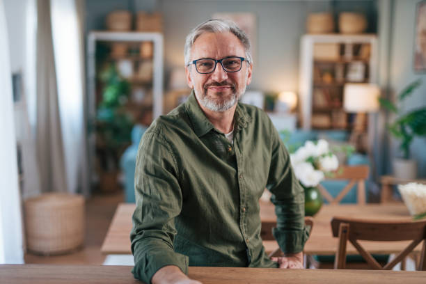 istock Portrait of smiling senior man 2012943042