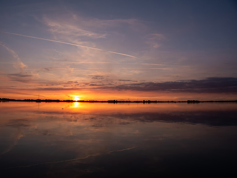 Sunset over De Morra lake in summer, De Friese Meren, Friesland, Netherlands