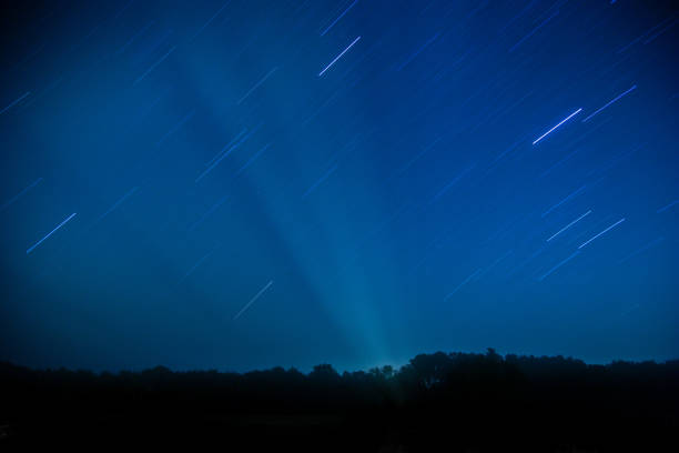 Star trails in a blue night sky