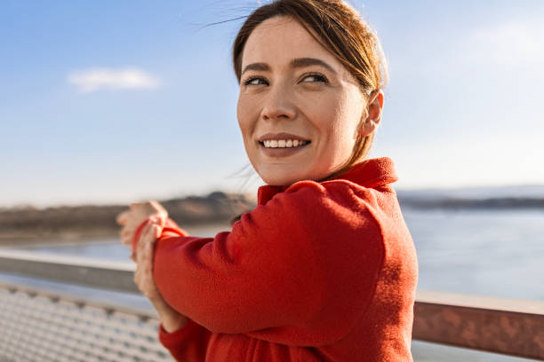 istock Beautiful Woman Embracing Stretching Poses 2013050873