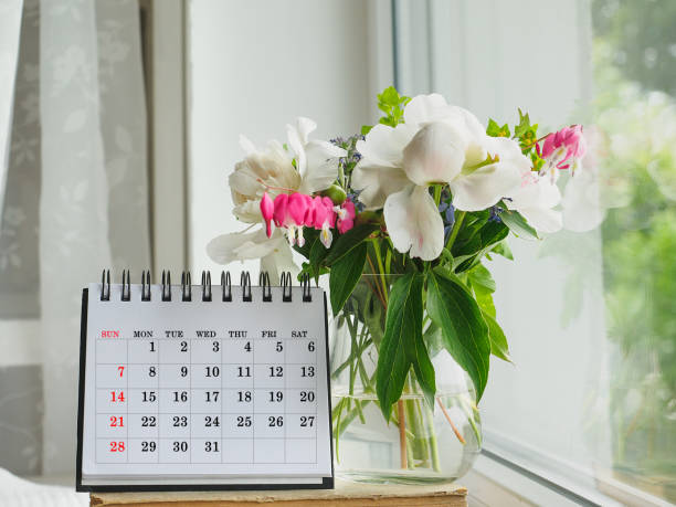 bouquet of bright flowers and calendar page - 16312 ストックフォトと画像