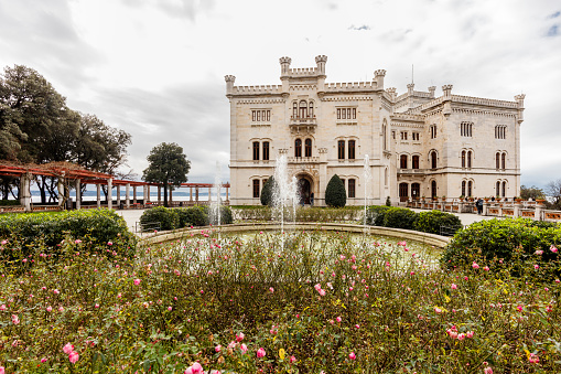 Trieste, Italy - February 12, 2024: Miramare Castle, where Archduke Ferdinand Maximilian of Habsburg and his wife Charlotte of Belgium lived  in the second half of the 19th century.