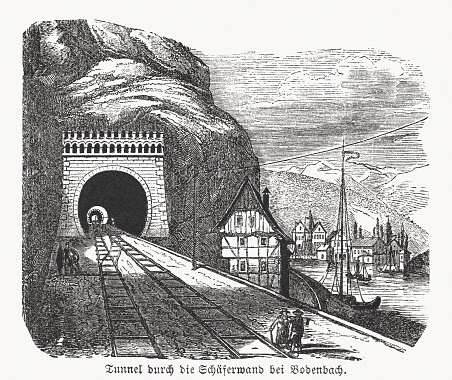 Historical view of the tunnel through the Schäferwand (Shepherd's Wall) in Bodenbach (Podmokly, part of Děčín, Czech Republic) on the Elbe river. This has been the most important railway border crossing between Bohemia and Saxony since 1851. Wood engraving, published in 1869.