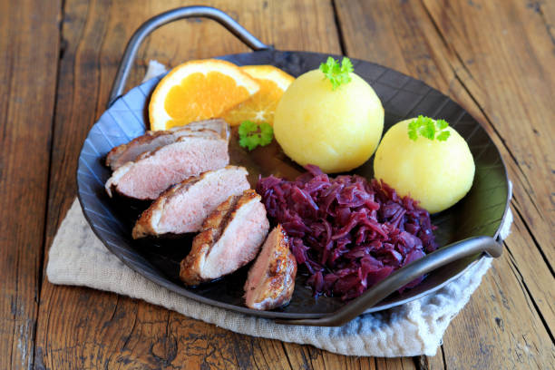 istock Roast duck breast with red cabbage and dumplings 2013090631