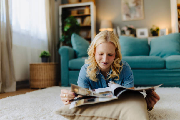 istock Woman reading a magazine 2013091216
