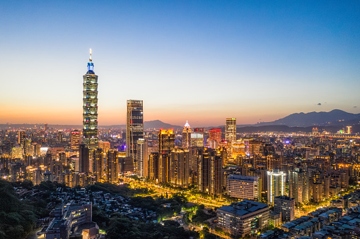 A view over Taiwan's capital, Taipei, photographed during the blue hour following sunset.