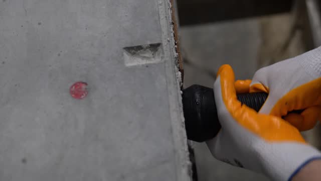 a worker turns the stopper