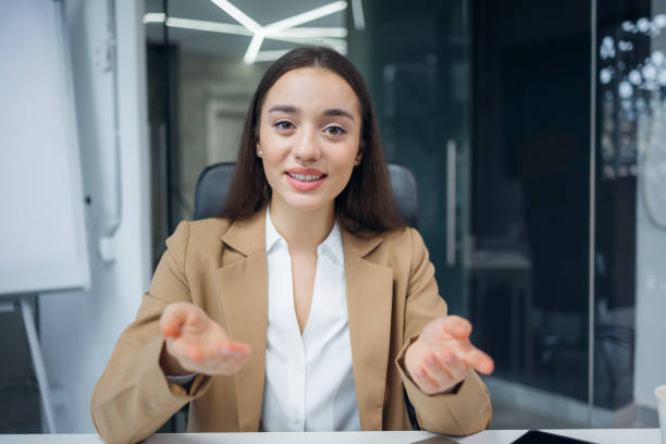 istock Business woman make negotiations using videoconference call. speak to camera 2013109877