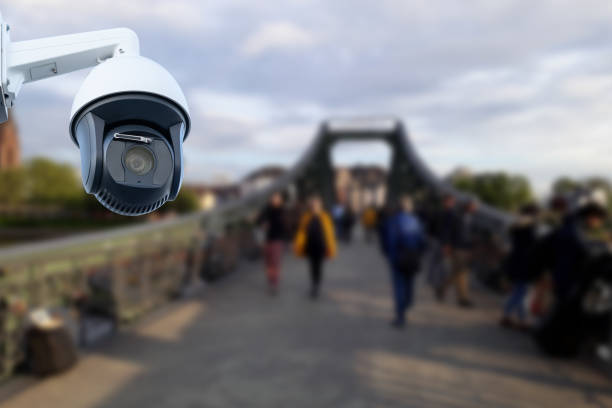 istock CCTV or surveillance computer operating at the bridge, walkway, street Blurred with people walking. 2013115735