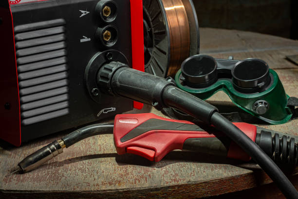 welder prepares welding machine
