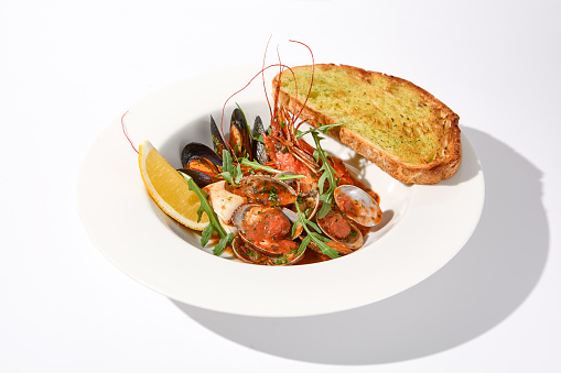 Seafood SautÃ© with Tomato Sauce and Ciabatta Crouton, a Delectable Medley for Seafood Lovers.