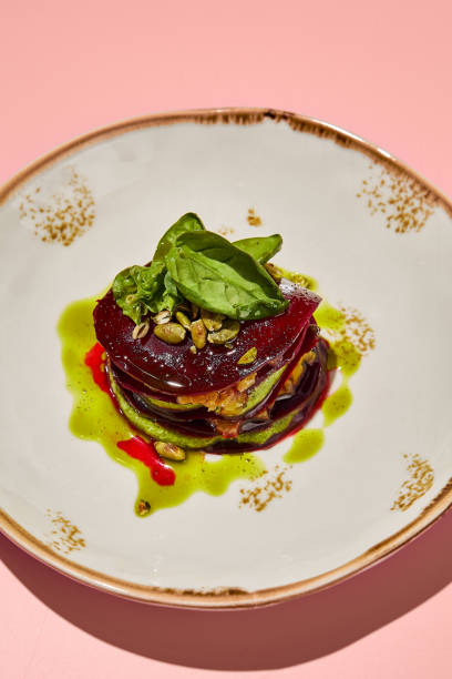 istock Beetroot mille-feuille with pesto sauce creatively plated, ideal for fresh and healthy menu options 2013157539