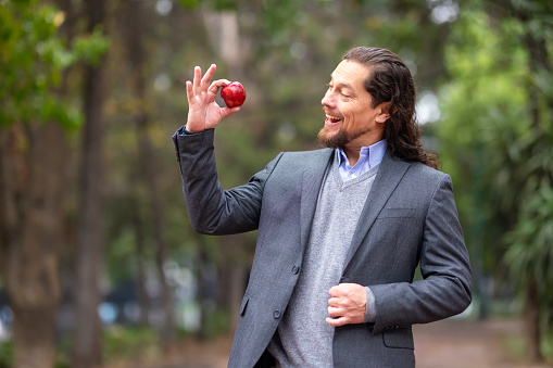 Man with apple in hand