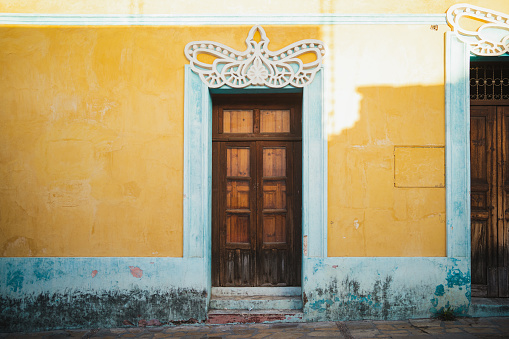 Colorful mexican house facade in San Cristobal de las Casas, Mexico