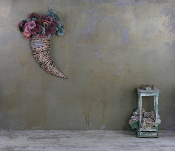 istock artificial flower arrangement on old wooden table 2013239278