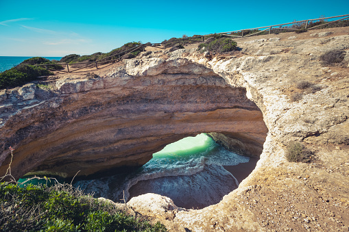beautiful benagil grotte, cliff hole, algarve coastline in portugal.