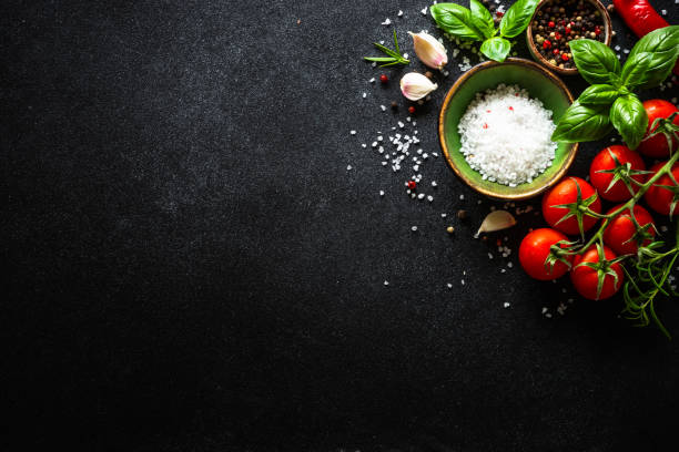 istock Food cooking background on black stone table. 2013259907