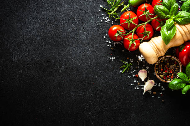 istock Food cooking background on black stone table. 2013259920
