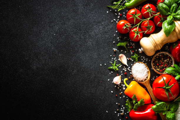 istock Food cooking background on black stone table. 2013259991