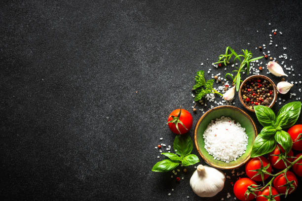 istock Food cooking background on black stone table. 2013260423