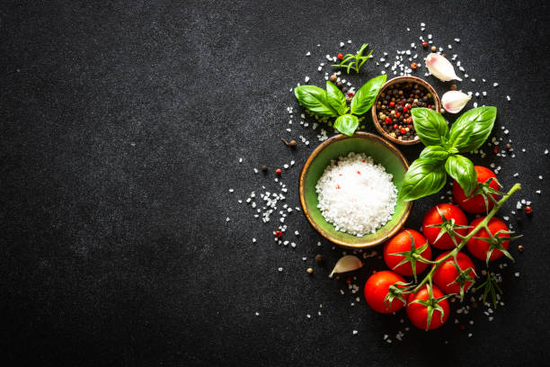 istock Food cooking background on black stone table. 2013260425