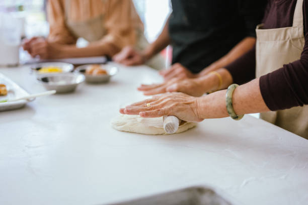 istock Culinary Diversity: Pasta Making Lessons with an Asian Chef at Professional Cooking School 2013287547