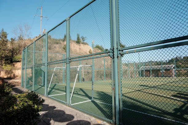 istock Wire mesh outside the football field 2013288654
