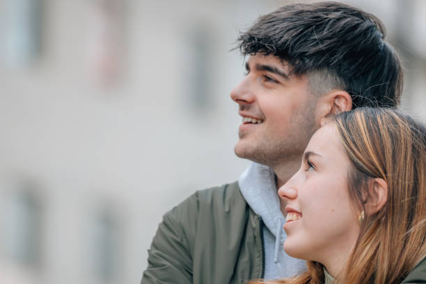 istock wedding couple hugging on the street 2013298691