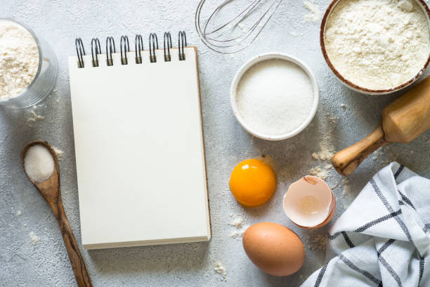 istock Baking background with cooking book and ingredients. 2013326550