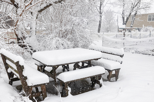 Picnic table covered with snow in Chalfont, Pa. USa
