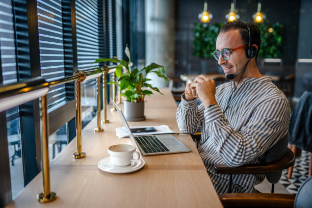 istock Portrait of a helpful customer service agent working in a call center 2013409511