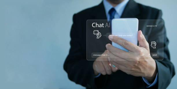 istock Chat ai concept. Businessman chats with AI on a smartphone. Chatting with a smart artificial intelligence, a customer chatbot service application, using command prompt to generate outputs. 2013510752