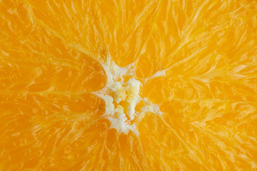 macro texture of a ripe bright orange