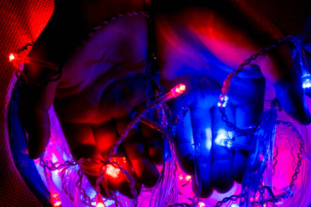 istock Close up of Christmas lights shining 2013547433