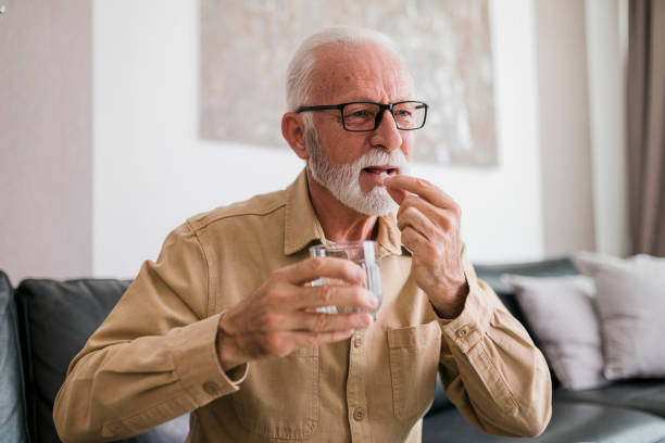 istock Senior man taking daily dosage of medicines 2013562488
