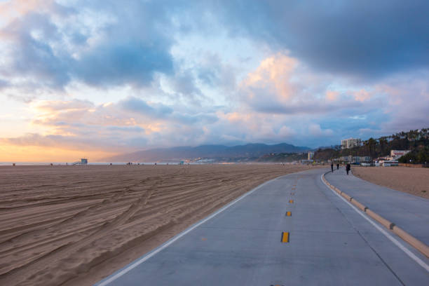 Sunset on the Marvin Braude Bike Path in Santa Monica  with colorful clouds over the Santa Monica Mountains.