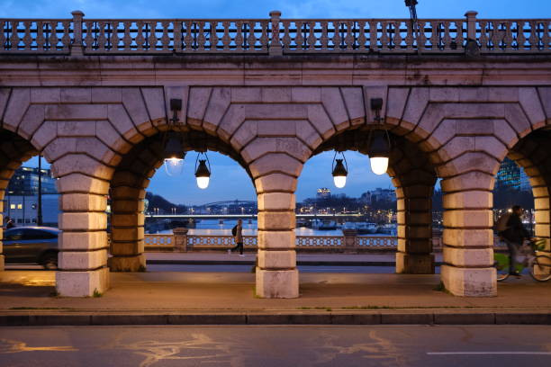 Paris, France - February 15, 2024: A view of the Bercy bridge during the blue hour.