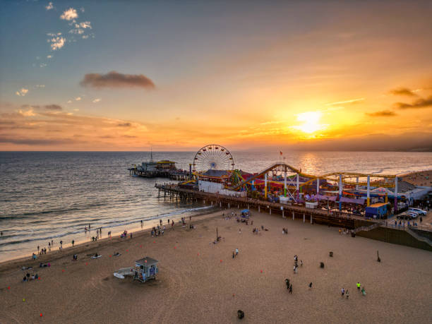 istock Sunsets in Santa Monica California with golden hour light 2013664608